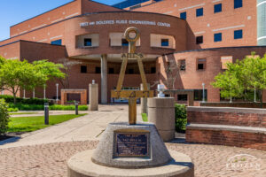 Sculpture of an architectual bent in the courtyard of Wright Statue University Russ Engineering School