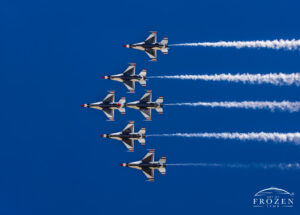A perfect alignment of the USAF Thunderbirds in their delta formation with the bottom of the aircraft facing the Columbus Air Show crowds