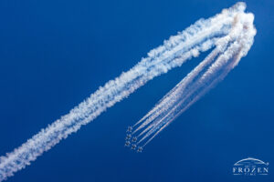An aviation photography fine art print featuring the USAF Thunderbirds as their sweeping delta formation cuts through the blue Columbus sky