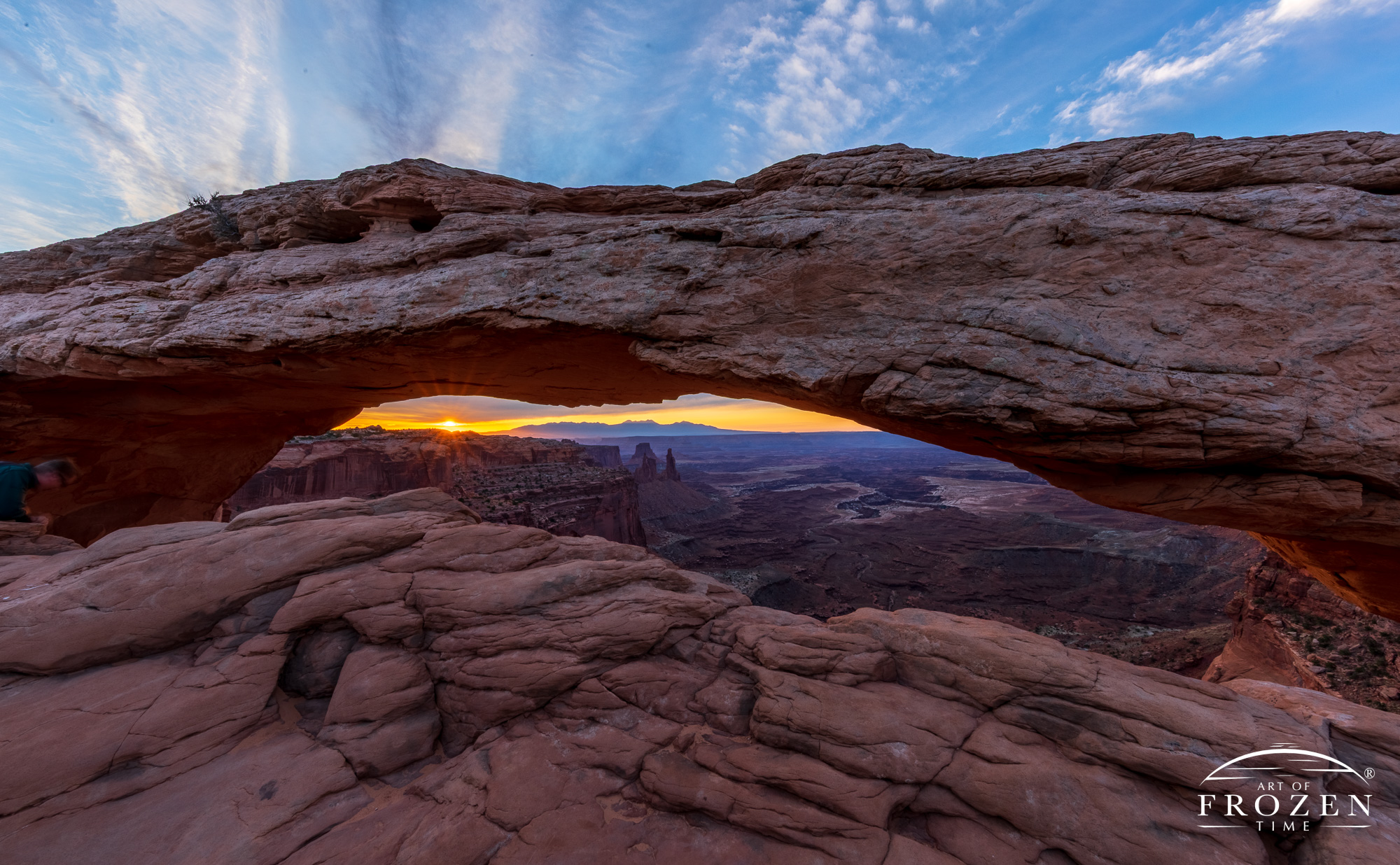 Still a magical view, the colors moved to colder tones as moving clouds began blocking the rising sun.