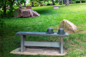 Wright Brothers' Bench with two Bowler Hats, all cast in bronze, with words that immortalize Orville and Wilbur's mastery of flight