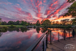 Colorful sunset over Cox Arboretum where pink stratocumulus clouds form intriguing leading lines to the western sky