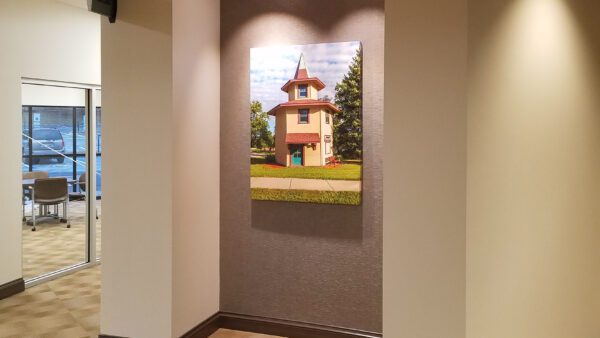A large canvas print in an alcove in the foyer of Kettering Health Network Years Ahead Health Center