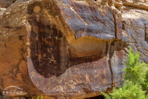 A petroglyph that was tapped into the rock varnish by native people 1,000 years ago depicting aspects of their life they wanted to share.
