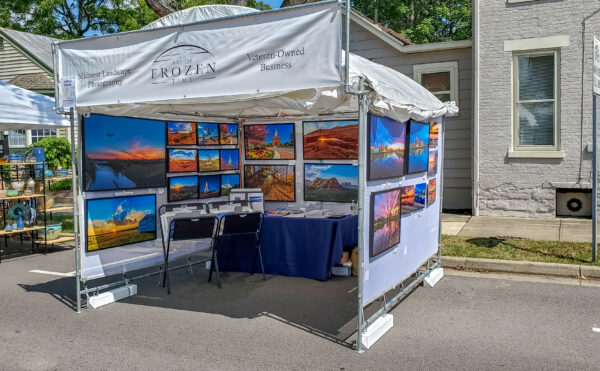 An art fair booth featuring vivid canvas prints of Dayton Ohio and our National Parks