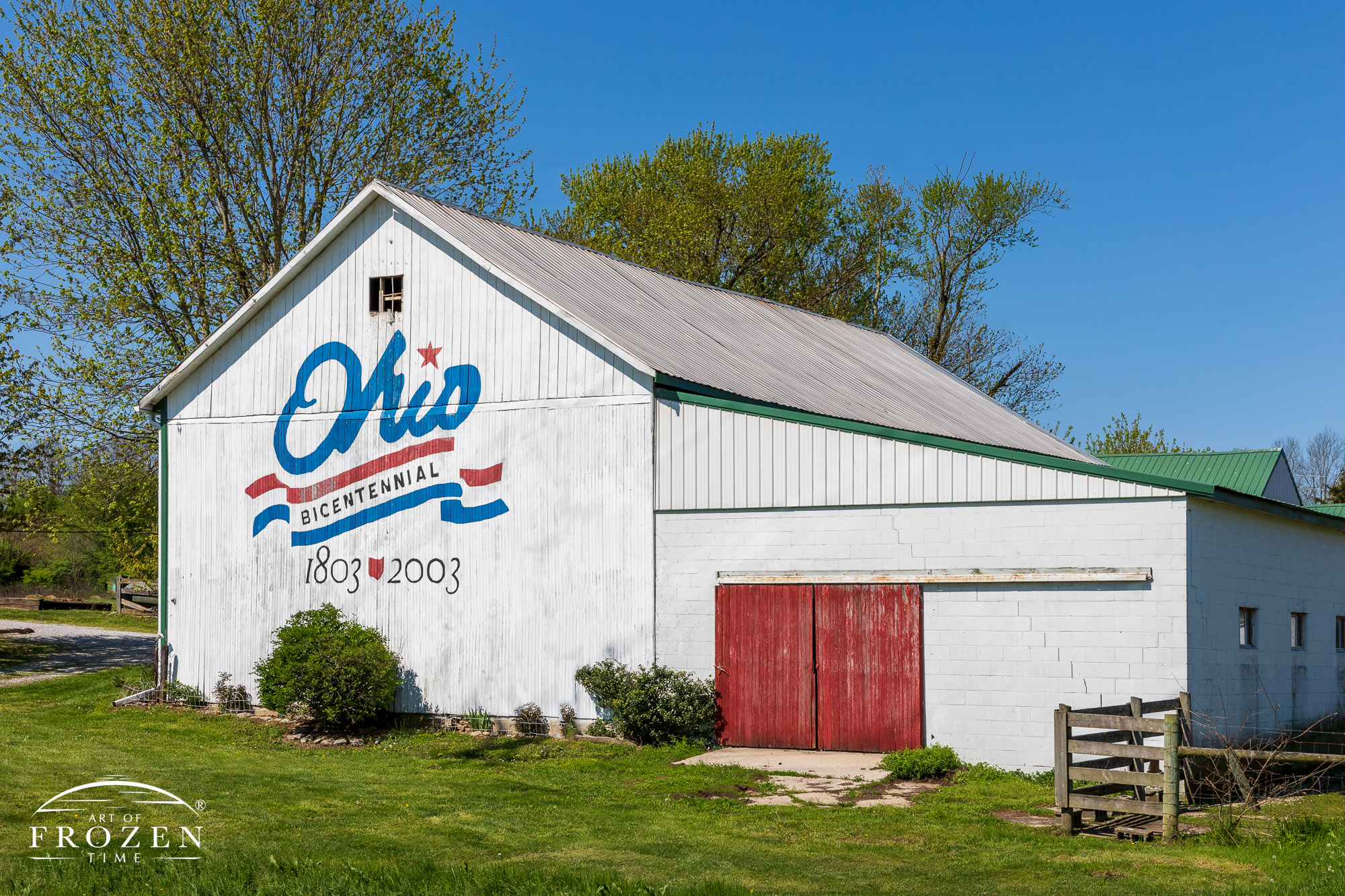 A well-maintained barn in Butler County Ohio with logo celebrating Ohio’s Bicentennial