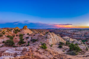 View of Grand Staircase-Escalante National Monument at twilight as distant storms gather on the horizon