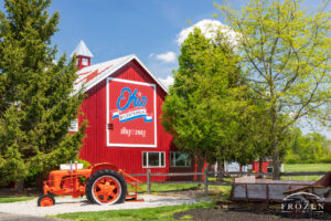 Classic red and white barn on a sunny day featuring an Ohio Bicentennial Logo