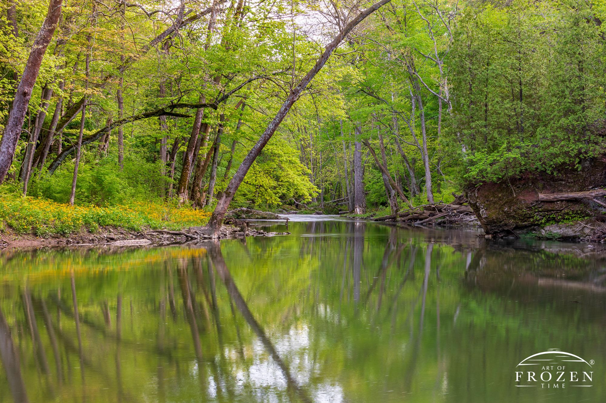 A springtime view of Clifton Gorge’s Blue Hole where the turbulent river briefly calms in a peaceful pool