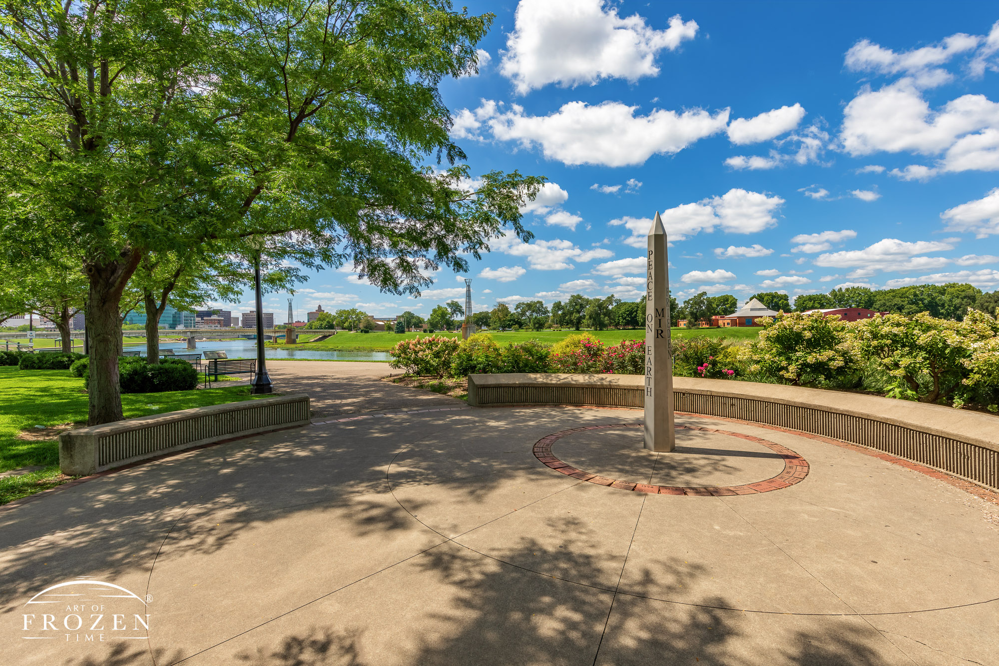 The Dayton Peace Pole Monument surrounding by gardens on the perfect Miami Valley day