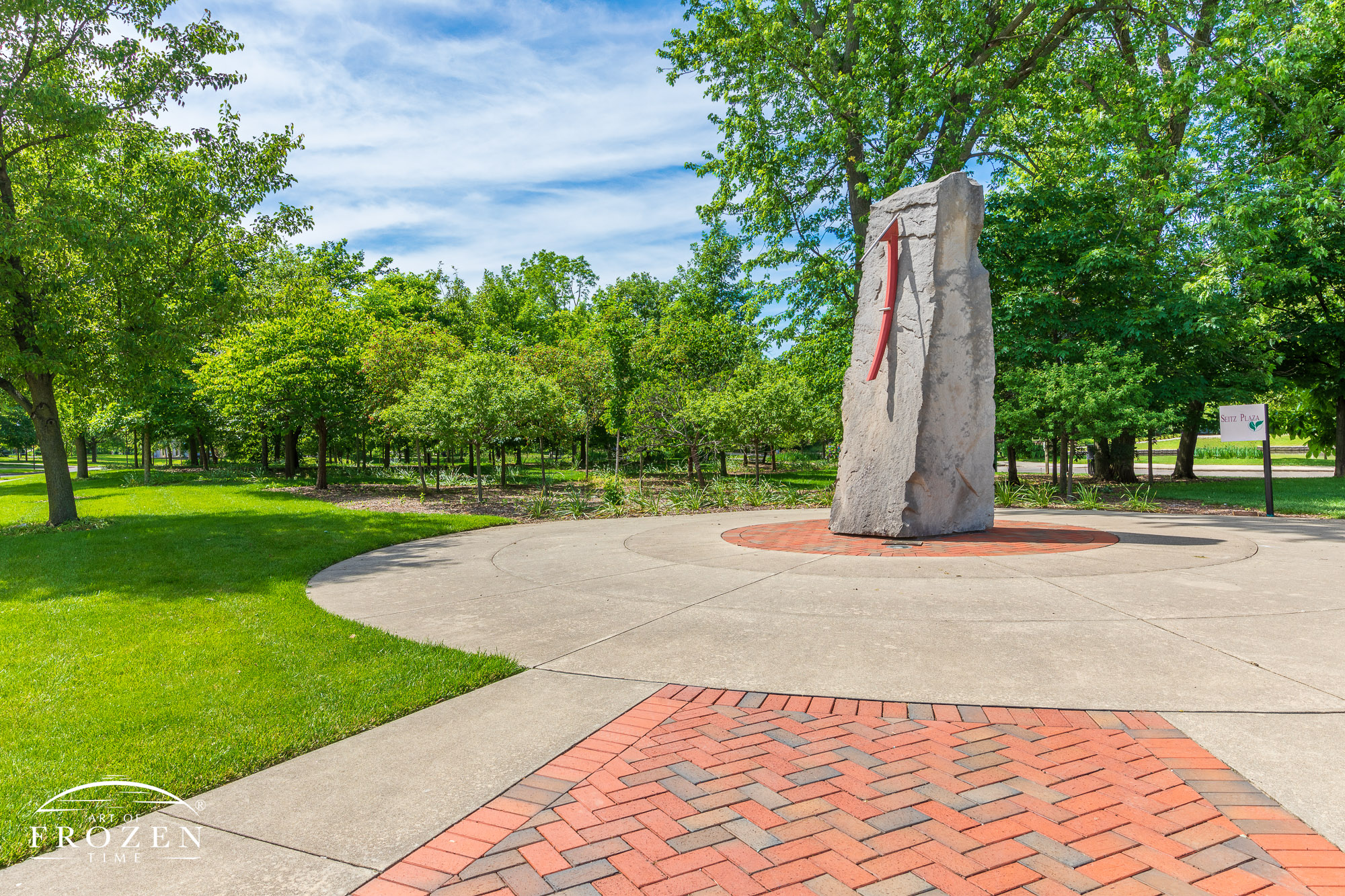 A limestone sculpture in Kettering Ohio which incorporates a sundial which delineates solar noon every September 11th.
