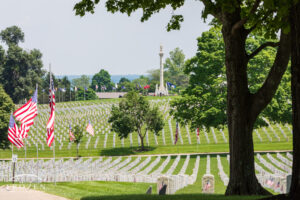 Dayton National Cemetery on Memorial Day where local scouts adorned each white headstone with a US flag
