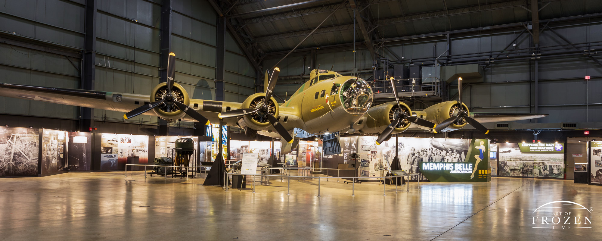 The famous and recently restored B-17 Memphis Belle displayed with its landing wheels retracted and its bomb bay doors open at the National Museum of the US Air Force