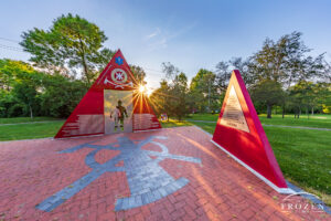 A sculpture honoring Miami Valley Firefighters called Firewall lies in Stubbs Park, Centerville Ohio basks in the golden morning light