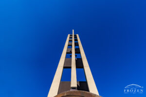 Standing at the base of the St Loenard Bell Tower looking upwards as the structure extends into the clear blue sky over Centerville Ohio