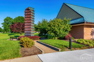 A 22’ ceramic sculpture of a stack of books outside the Washington-Centerville Library on a pretty summer morning.