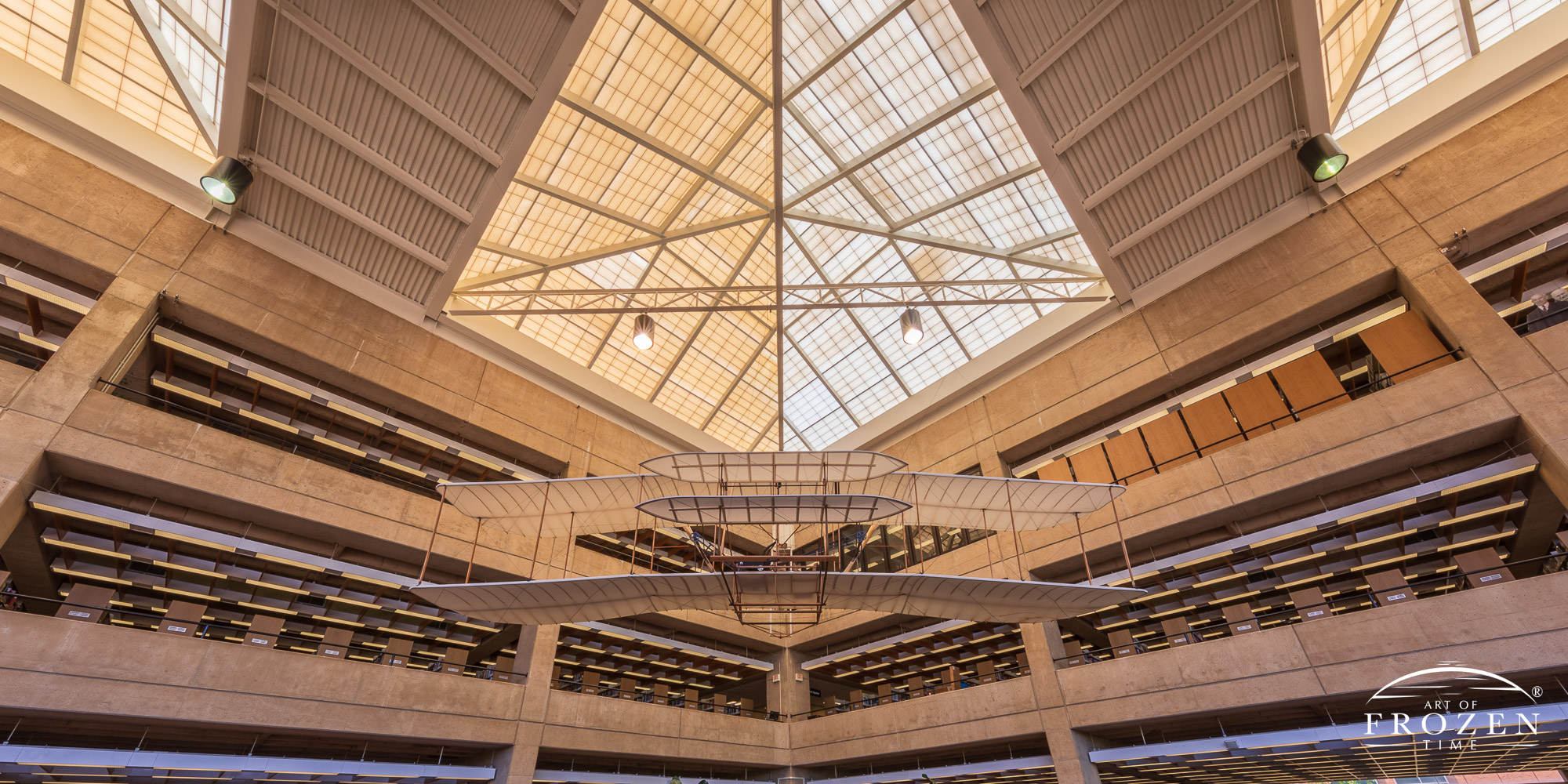 A full-size replica of the Wright Brothers 1903 Flyer hangs in the Wright State University library