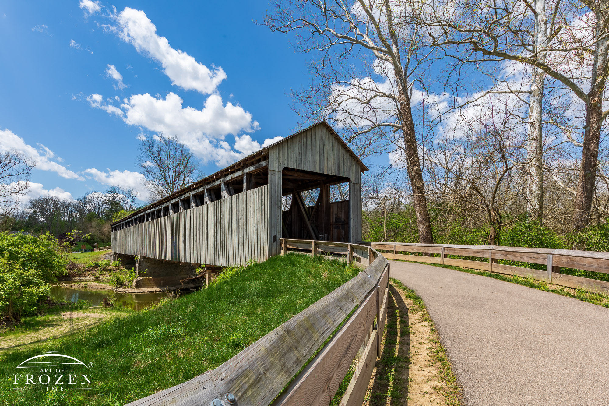 One of the longest covered bridges in Ohio with spans Four Mile Creek on a spring day