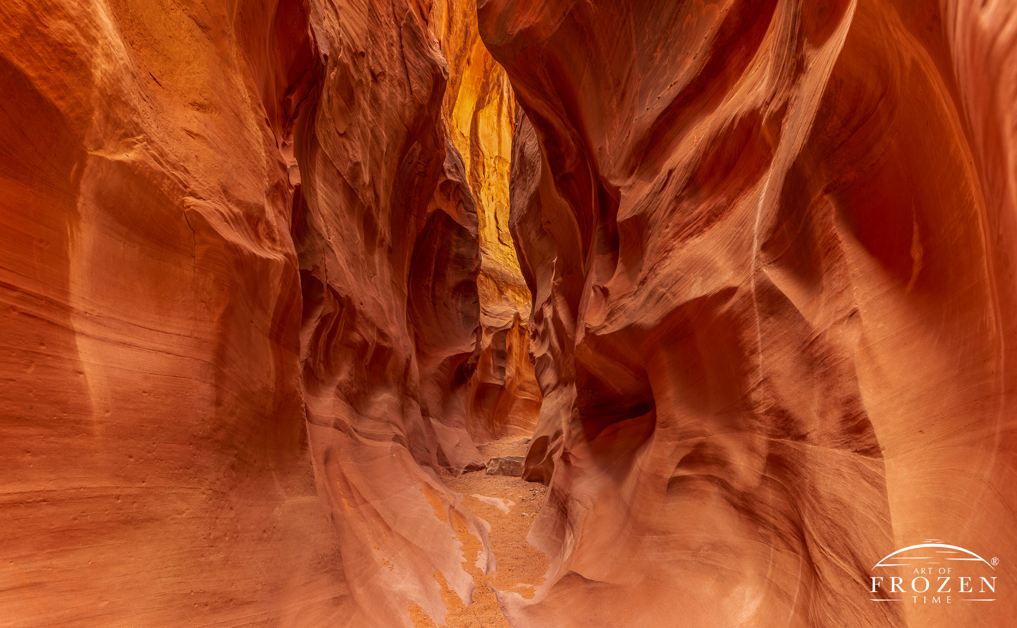 Dry Fork Slot Canyon where erosion created interesting flowing shapes in the Navajo Sandstone that play with light and shadows
