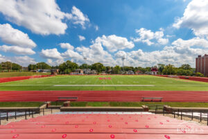 Hosting football and track since 1923, Wittenberg University Tigers field lies under blue skies and cumulus clouds