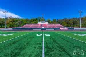 Wide angle view of the Franklin High School’s Wildcat stadium a view of the bleachers from mid field