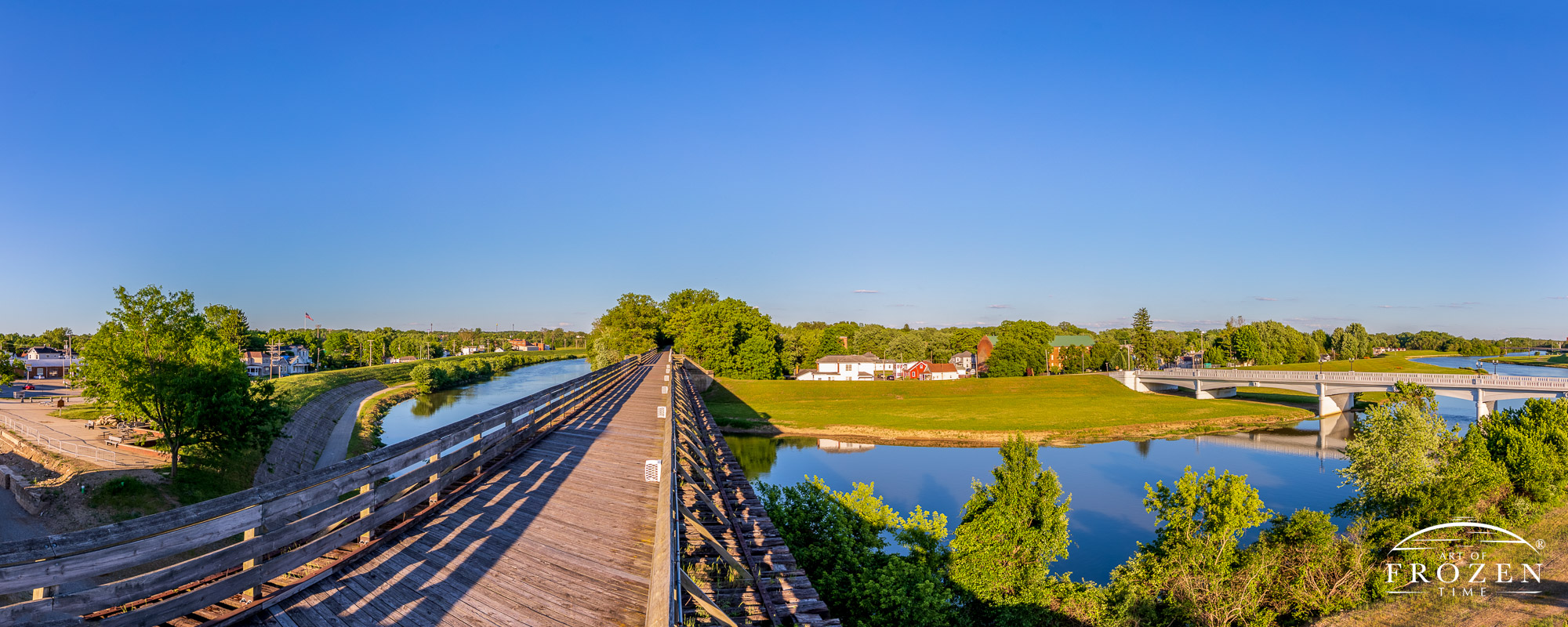 Panoramic view of Piqua Ohio’s Linear Park as it crosses the Great Miami River on a perfect June evening