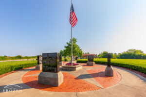 A Veterans Park delineated by five granite markers celebrating each military service