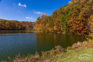 Hosterman Lake, near Enon Ohio is a tree-lined lake offering visitors a quiet space under blue skies