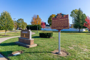 An Ohio Historical Maker and a granite memorial detailing the sacrifice made by Airman First Class William Pitsenbarger