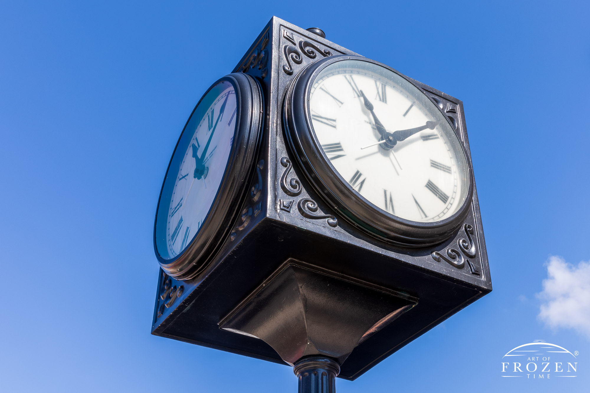A close view of the four-side clock residing in McColloch Square, Piqua Ohio