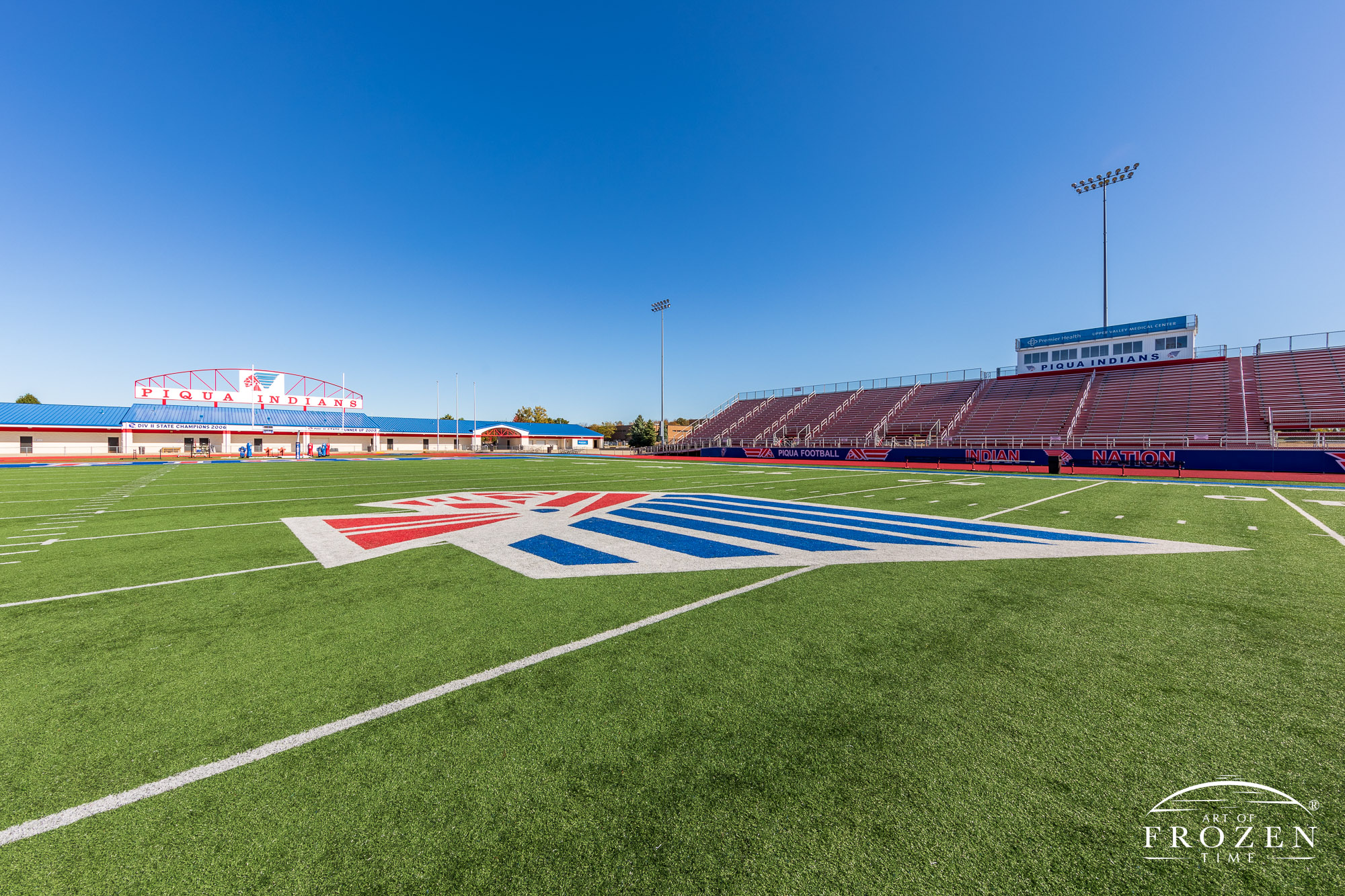 The Piqua Ohio High School Stadium is an impressive facility with AstroTurf which displays bright red and blue colors under clear blue Miami County Ohio skies