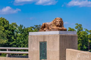 Cast iron lion from 1873 guards a local bridge in Franklin Ohio