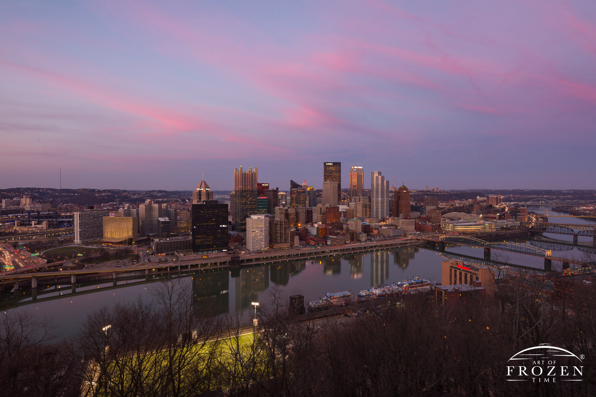 A panoramic twilight view of downtown Pittsburgh Pennsylvania from the elevated Mount Washington