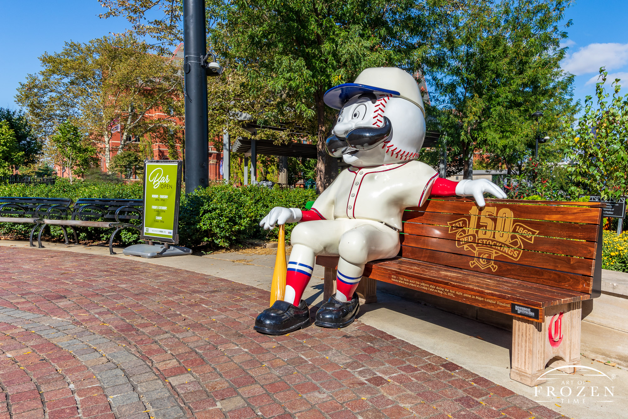 Cincinnati Reds Mr. Redlegs bench featuring a mustached baseball head in a historic team uniform.
