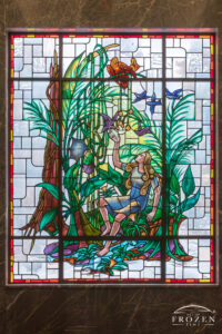 Rima – The Bird Girl Stained-glass Window, Woodland Cemetery and Arboretum | Art of Frozen Time Stained-glass window in Woodland Mausoleum depicting Rima the Bird Girl from Green Mansions surrounded by tropical forest imagery in Dayton Ohio