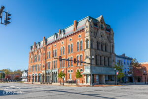 A three-story red brick building with and intricate stone façade which honors Shelby county Ohio Veterans