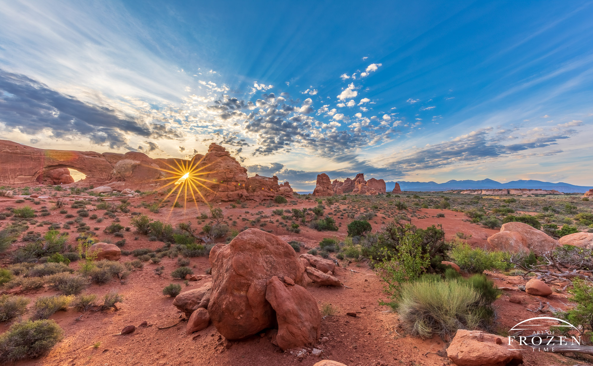 North & South Windows of Arches National Park’s at sunrise where the 2 adjacent formations form a pair of Spectacles