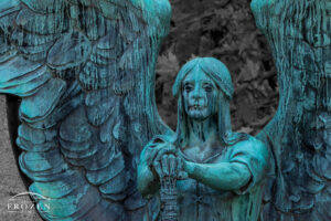Francis Haserot headstone in Cleveland’s Lakeview Cemetery showing a weeping angel where streaks run down her cheeks.