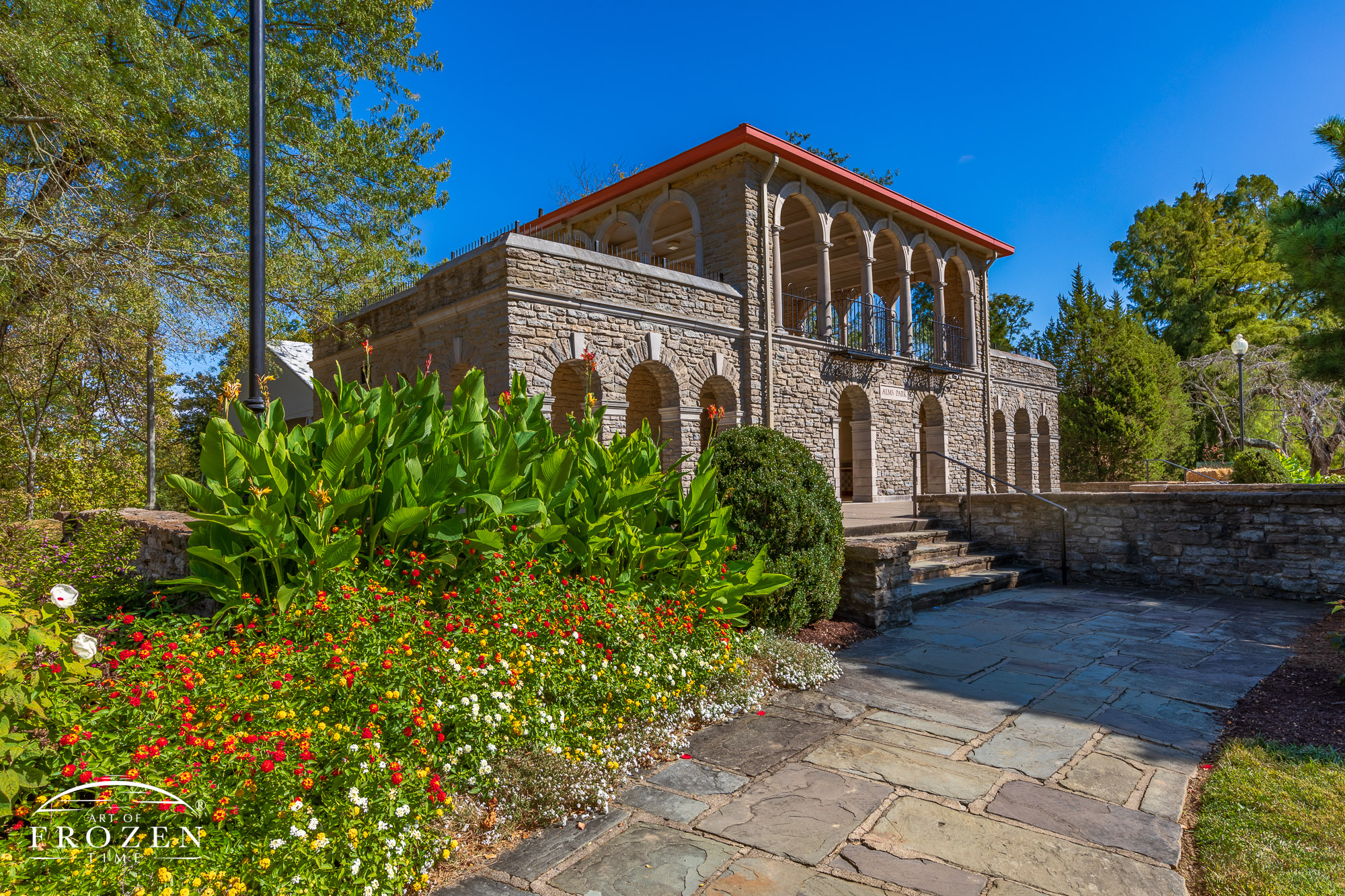 The Alms Park Pavilion east of Cincinnati built in Italian Renaissance style stands in pretty light on an early autumn day.