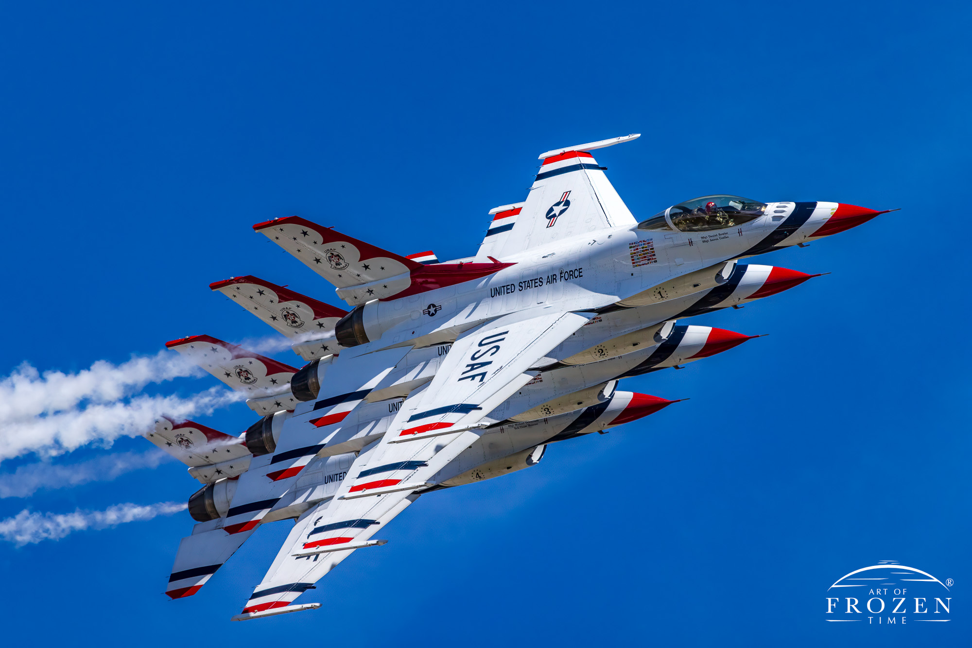 This Aviation Fine Art Print captures a tight formation of USAF Thunderbirds in echelon glisten under blue azure skies