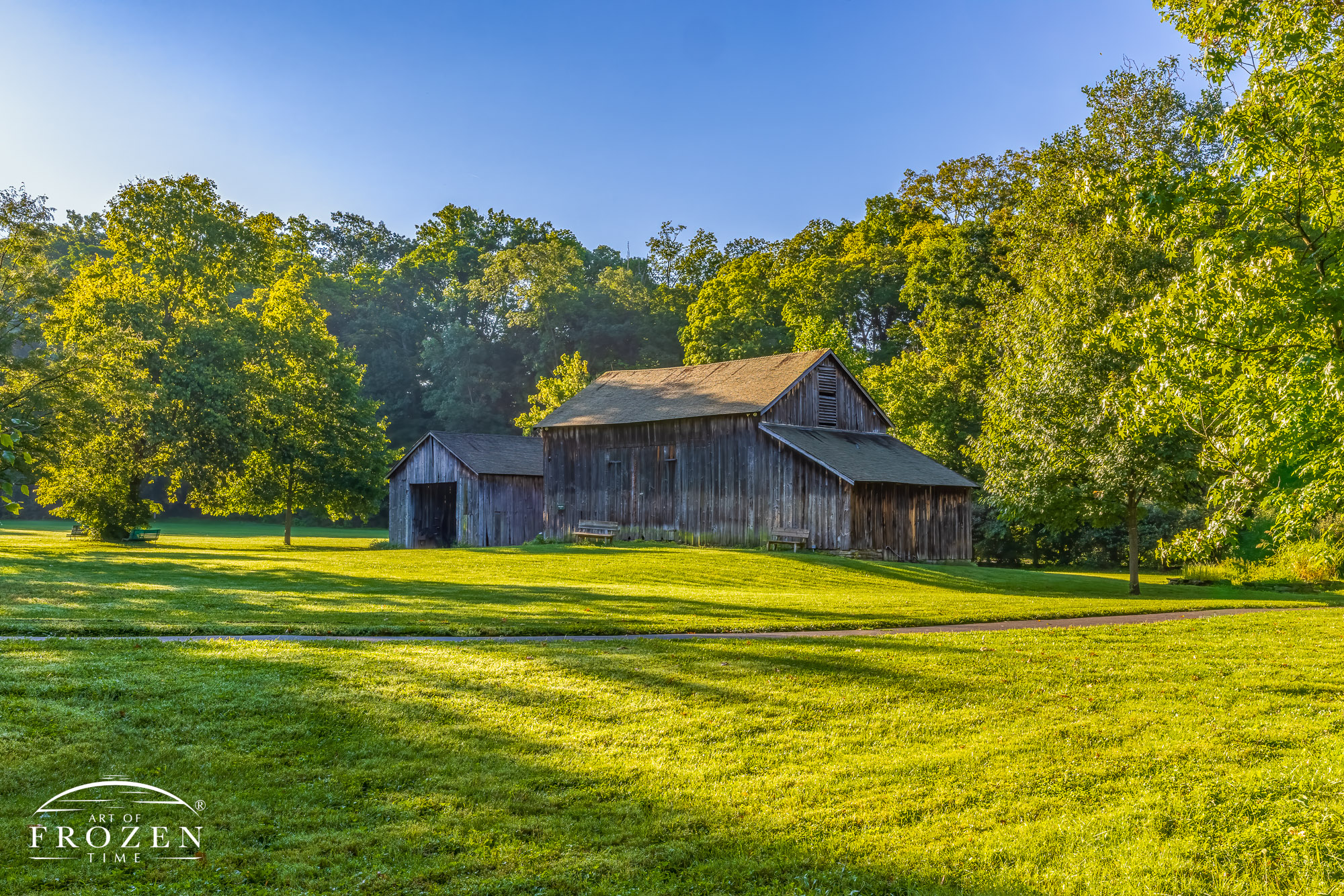 A nostalgic farm scene with the historic Gatch Barn in the distance during an early morning walk at Sharon Woods.