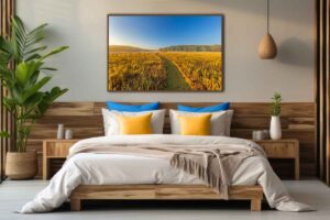 An AI room visualization featuring my fine art print of Ohio Nature Photography featuring a prairie trail meandering through the golden rod as fog hangs over Morris Reserve